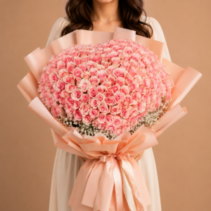 120 Pink Roses Heart-Shaped Bouquet featuring 120 pink roses arranged in a romantic heart shape with white baby’s breath, luxury wrapping, and elegant ribbon detailing for same-day flower delivery.