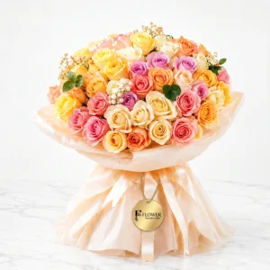 Peonies arranged with lush green fillers in an artisanal woven basket from flowerdeliverydubai.