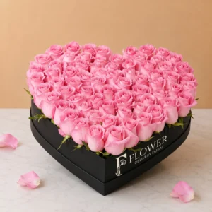 Pink Roses Heart luxury arrangement featuring 60 fresh pink roses in a heart-shaped box with white fillers, perfect romantic gift for birthdays and proposals.