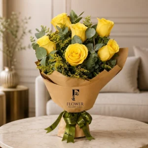 Bouquet of 40 Yellow Roses wrapped in yellow-orange paper with ribbon. Same day flower delivery Dubai. Fresh joyful gift.