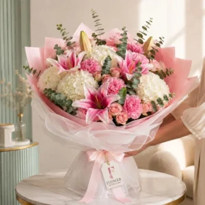 Pink Carnation Bouquet with baby’s breath and limonium flowers wrapped in premium paper for flower delivery in Dubai