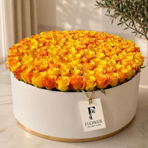 Extra Large Sun-Kissed Roses Box with 300 orange and yellow roses in a luxury white round box, perfect for same-day flower delivery in Dubai and special celebrations.