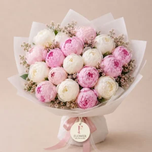 Ivory Peonies Bouquet with white and pink peonies wrapped in premium white paper for elegant flower delivery in Dubai