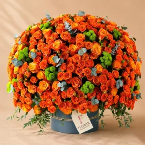Sunlit Charm Floral Box with 70 orange spray roses, 100 orange roses and green chrysanthemums in a premium box, vibrant luxury flower delivery Dubai arrangement for birthdays and celebrations.