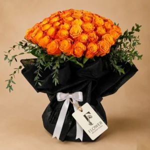 Sunset Rose Bouquet with 40 orange roses, green fillers, and elegant black wrapping, perfect flower delivery Dubai for bold modern floral gifts.